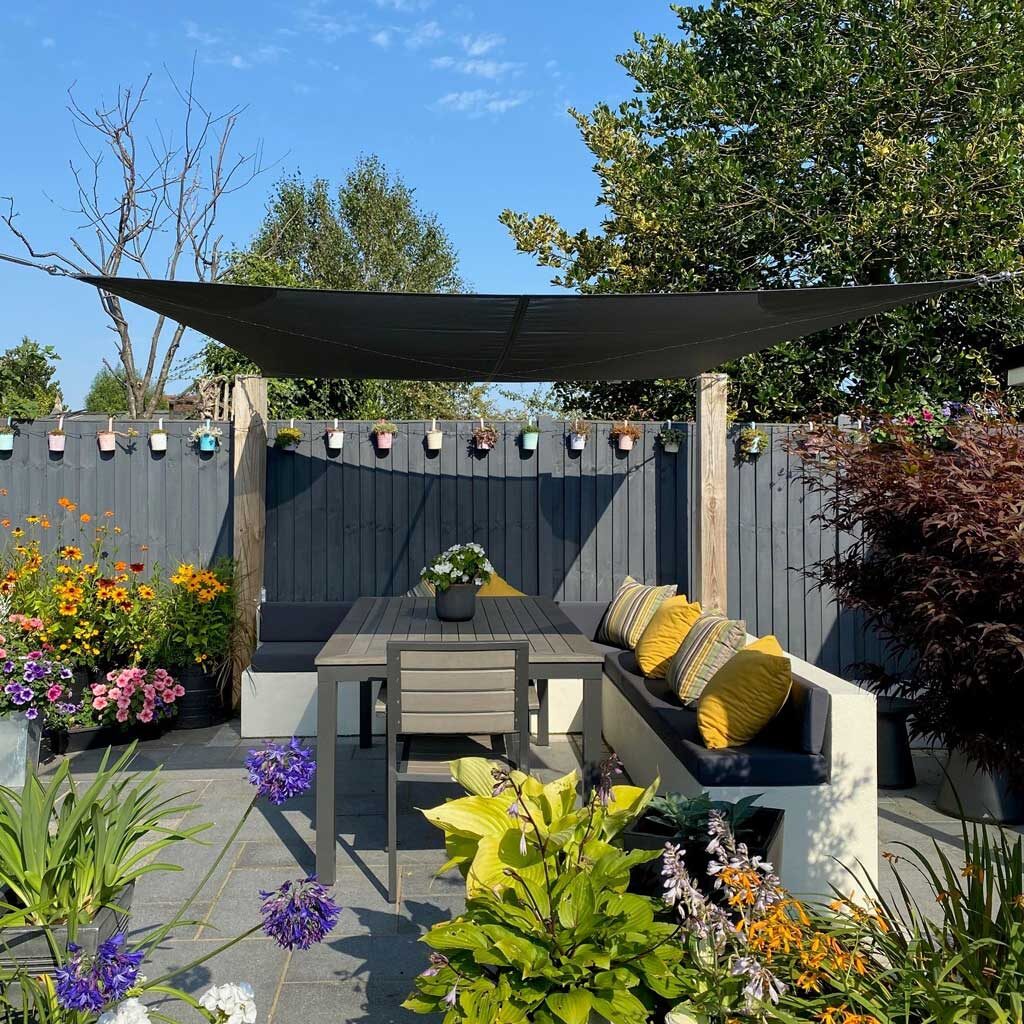 sail shade installation over sofa